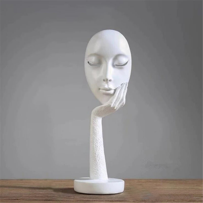 Contemplative Woman Face Statues